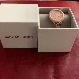 NWT Michael Kors Rose Gold Runway watch.
